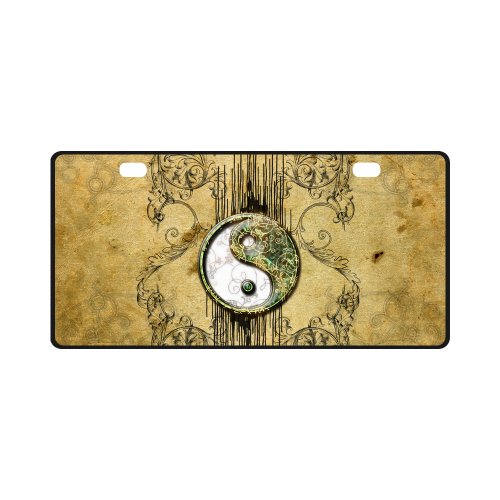 Ying and yang with decorative floral elements License Plate