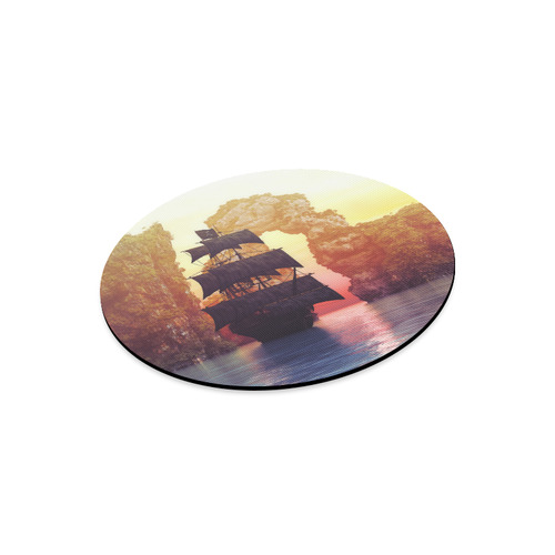 A pirate ship off an island at a sunset Round Mousepad