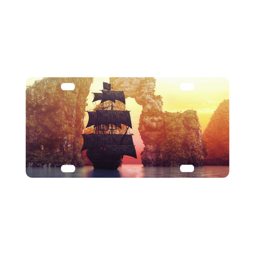 A pirate ship off an island at a sunset Classic License Plate