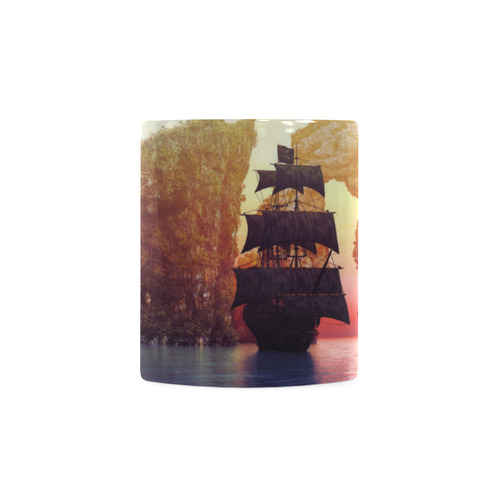 A pirate ship off an island at a sunset White Mug(11OZ)