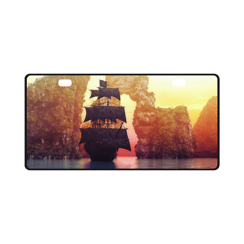 A pirate ship off an island at a sunset License Plate