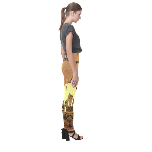 Beautiful horse silhouette in yellow colors Cassandra Women's Leggings (Model L01)