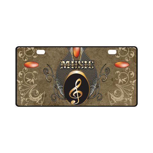 Golden clef and floral design License Plate