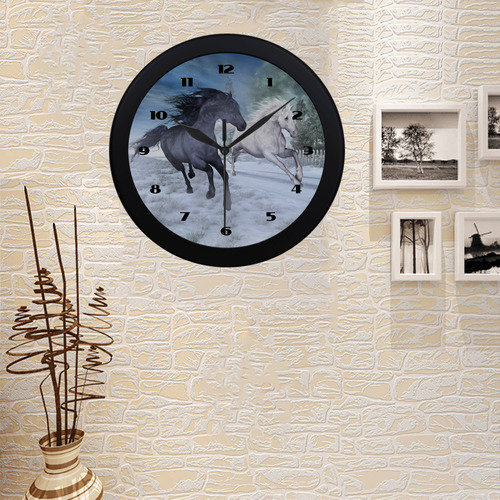 Two horses galloping through a winter landscape Circular Plastic Wall clock