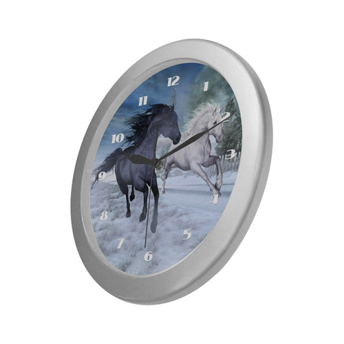 Two horses galloping through a winter landscape Silver Color Wall Clock