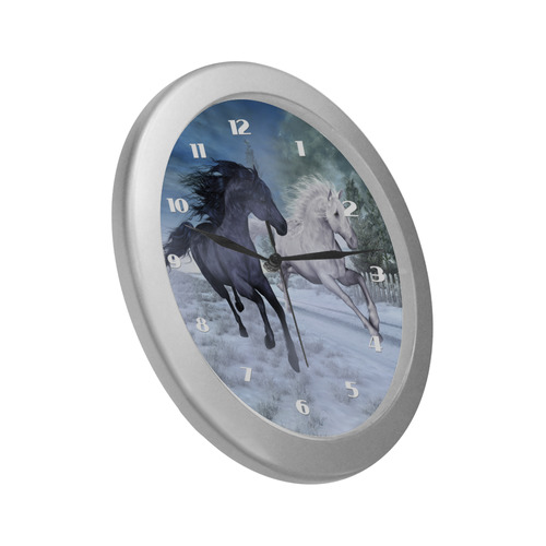 Two horses galloping through a winter landscape Silver Color Wall Clock