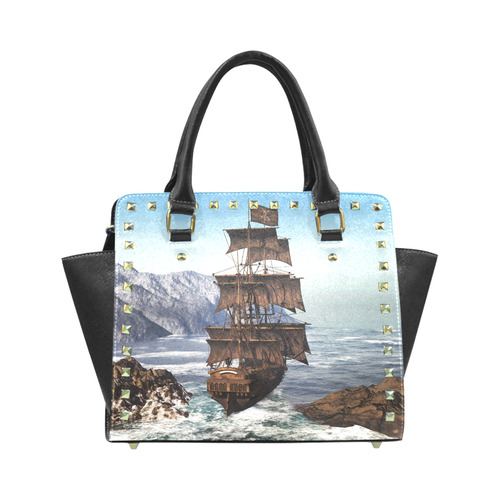 A pirate ship sails through the coastal Rivet Shoulder Handbag (Model 1645)