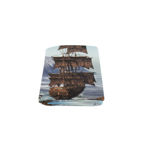 A pirate ship sails through the coastal Blanket 40"x50"