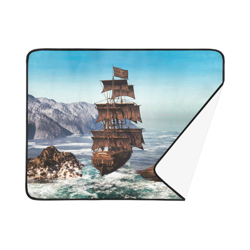 A pirate ship sails through the coastal Beach Mat 78"x 60"