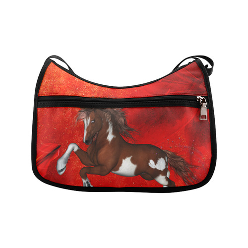 Wild horse on red background Crossbody Bags (Model 1616)