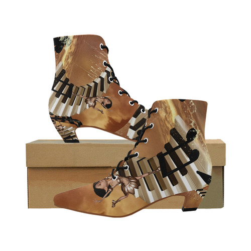 Little fairy dancing on the piano