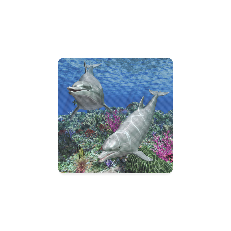 Two cute dolphins swim in the ocean Square Coaster