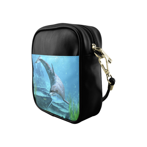 A proud dolphin swims in the ocean Sling Bag (Model 1627)