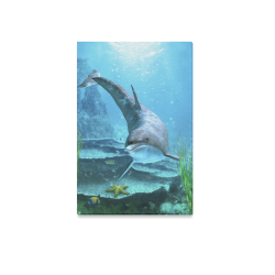 A proud dolphin swims in the ocean Canvas Print 12"x18"