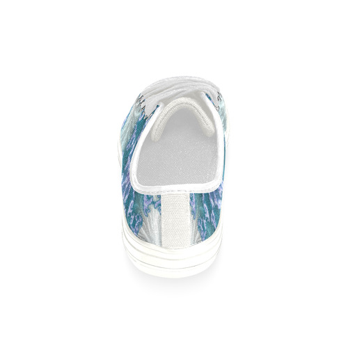 Floral spiral in soft blue on flowing fabric Women's Classic Canvas Shoes (Model 018)