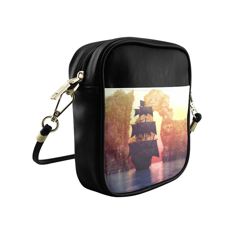 A pirate ship off an island at a sunset Sling Bag (Model 1627)