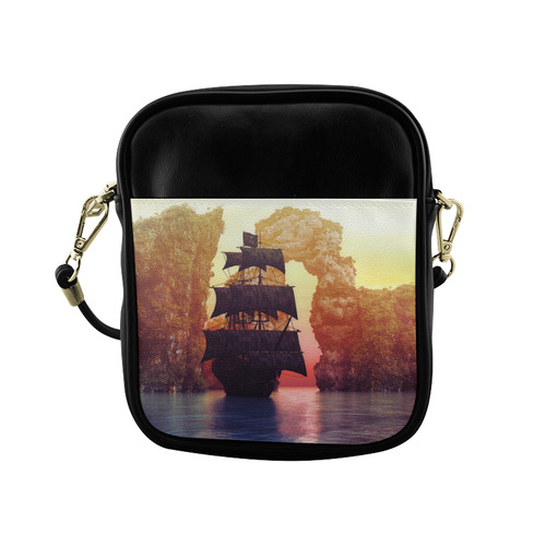 A pirate ship off an island at a sunset Sling Bag (Model 1627)
