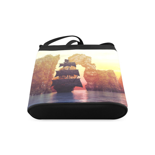 A pirate ship off an island at a sunset Crossbody Bags (Model 1613)