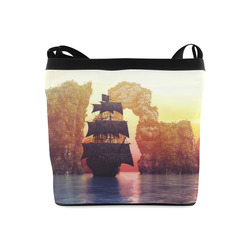A pirate ship off an island at a sunset Crossbody Bags (Model 1613)