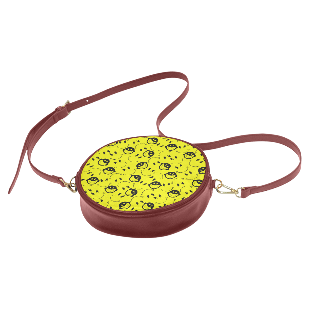 monkey tongue out on yellow Round Sling Bag (Model 1647)